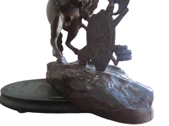 A French spelter figure, knight on rearing horse, St George, oval wooden plinth base, 50cm, c.1900