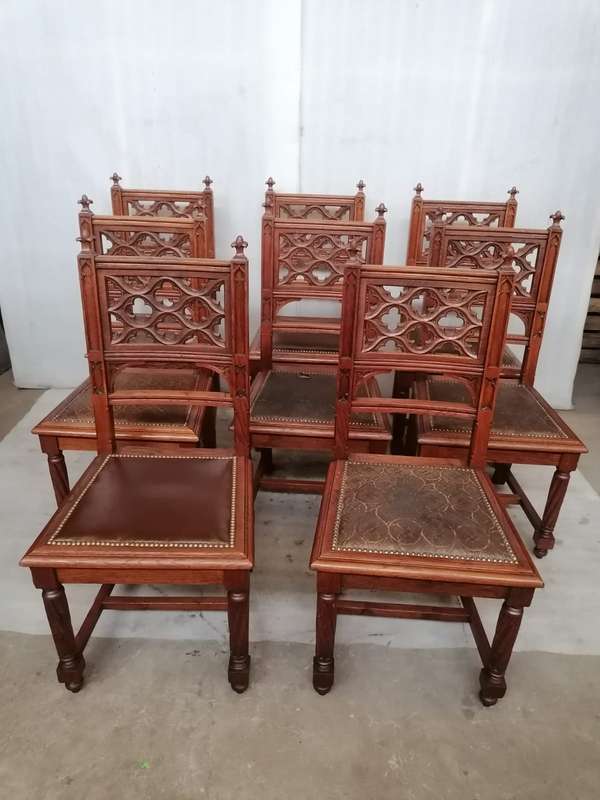 8 Oak Gothic style chairs
