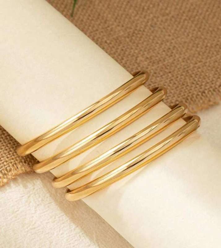4 piece stackable metal bangles in colour gold