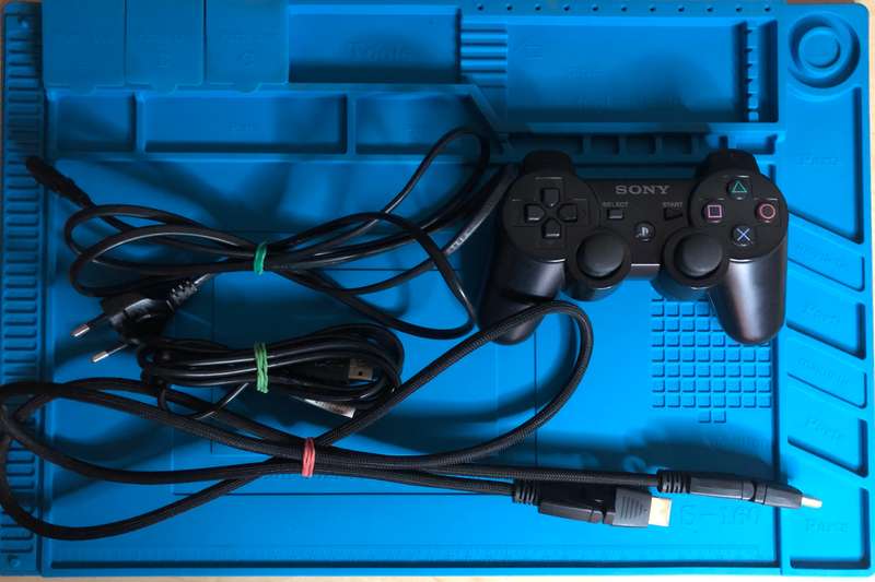 PlayStation 3 Console (CECH-2504B) + Game Bundle