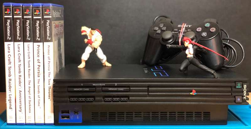 PlayStation 2 Console (SCPH-39003) + Game Bundle