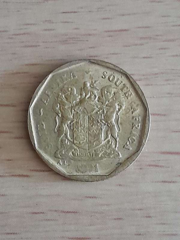 Error Coin - 10 Cents - Date not visible.