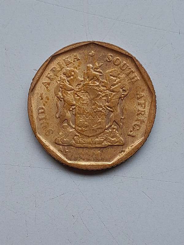Error Coin - 10 Cents - Date not visible.