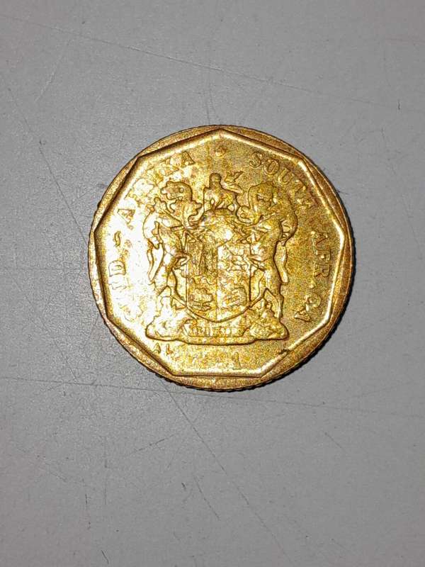 Error Coin - 10 Cents - Date not visible.