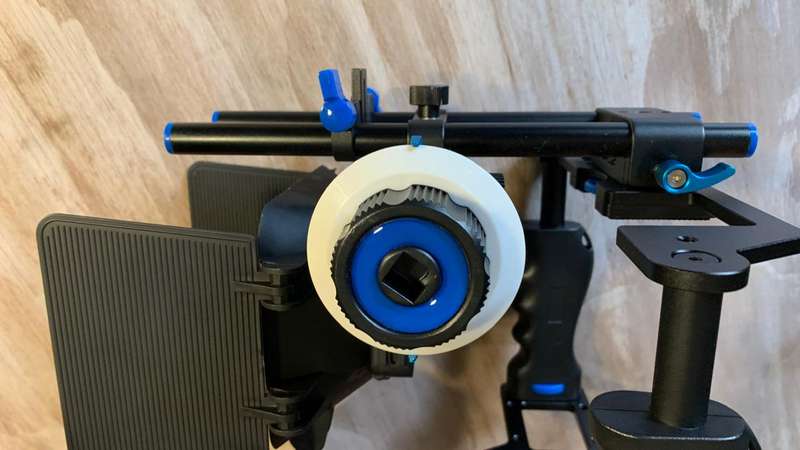 Universal Camera Cage Rig Kit with ND filter holder attached. Grip handles, cold shoe follow focus.