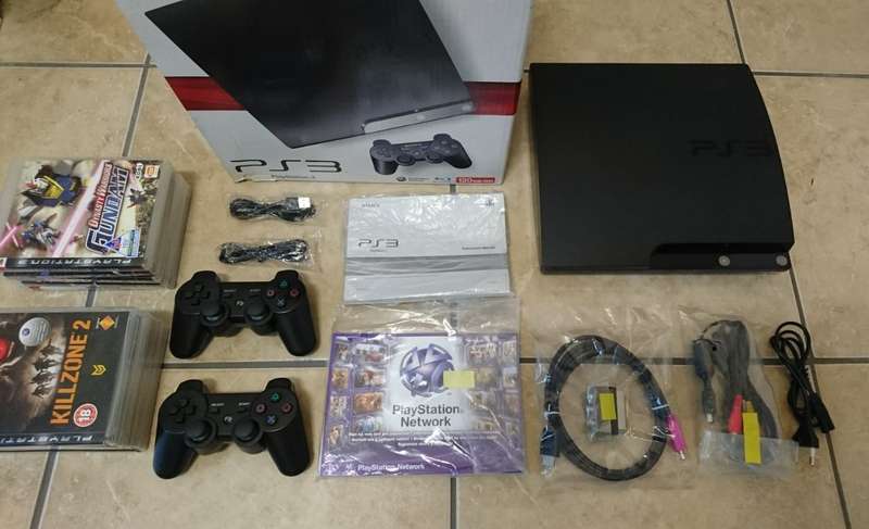 Sony PlayStation 3 Slim 120GB Console + 2 New Controllers + 6 Games (PS3)