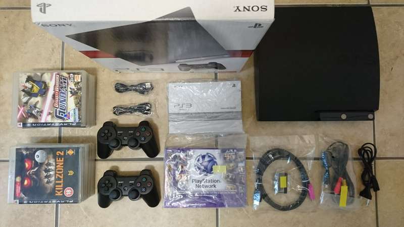 Sony PlayStation 3 Slim 120GB Console + 2 New Controllers + 6 Games (PS3)