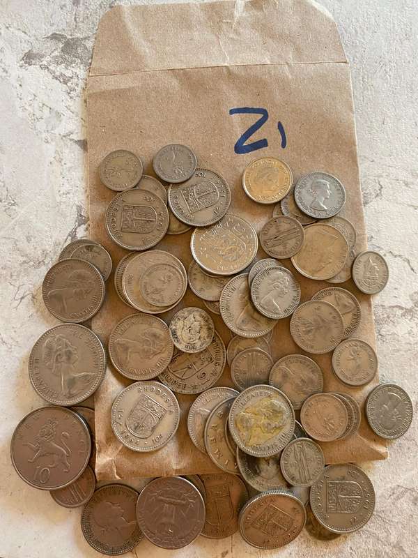 As per picture - Large lot of World coins up for grabs. One bid takes all