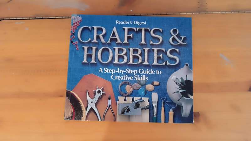 Beads with container and book