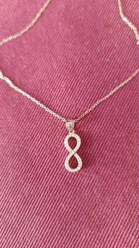 Sterling silver with cubic Zirconias Infinity Necklace and matching Bracelet