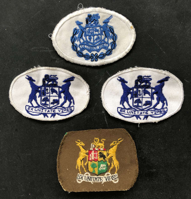 MILITARIA EX UNITATE VIRES CLOTH BADGES COLLECTION OF FOUR