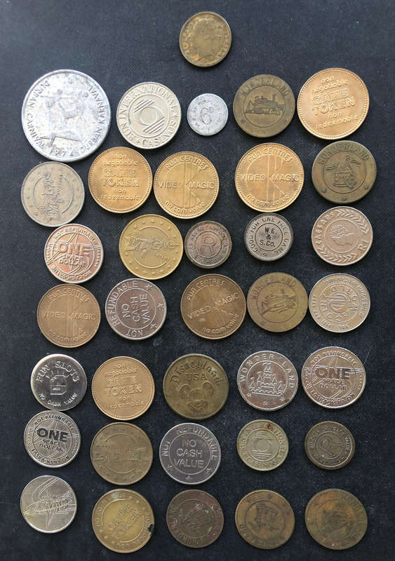 1860 CASINO TOKEN AND COLLECTION OF 35 OTHERS