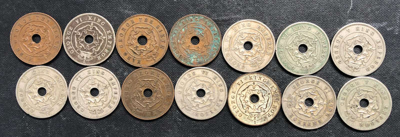 COLLECTION OF 14 SOUTHERN RHODESIAN PENNIES DATING FROM 1935 TO 1951