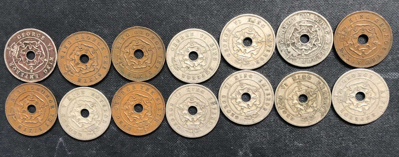 COLLECTION OF 14 SOUTHERN RHODESIAN PENNIES DATING FROM 1934 TO 1952