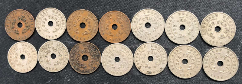 COLLECTION OF 14 SOUTHERN RHODESIAN PENNIES DATING FROM 1934 TO 1951