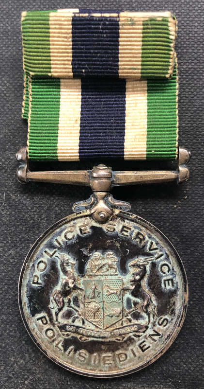 MEDAL SOUTH AFRICAN POLICE SERVICE TYPE 3 (1951) ISSUED TO CONSTABLE GTvW WILKEN INCLUDES BAR RIBBON