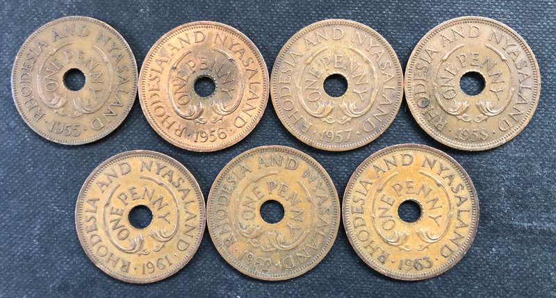 RHODESIA AND NYASALAND ONE PENNY COLLECTION OF 7 DATING FROM 1955 -1958 AND 1961-1963