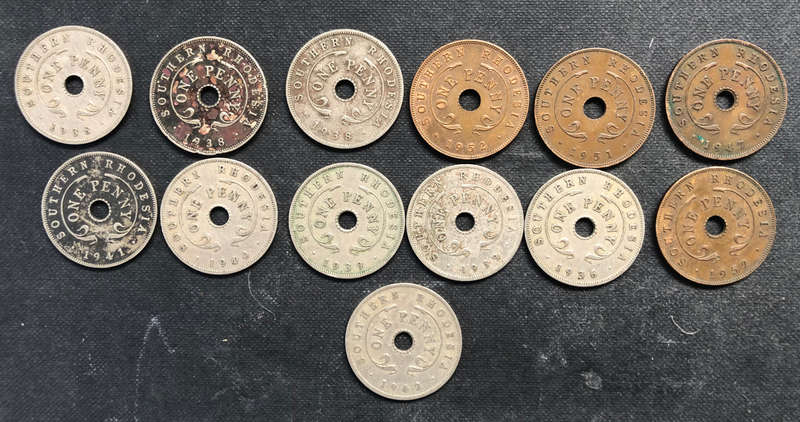 COLLECTION OF 13 SOUTHERN RHODESIAN PENNIES DATING FROM 1938 TO 1952