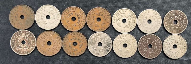 COLLECTION OF 14 SOUTHERN RHODESIAN PENNIES DATING FROM 1935 TO 1952
