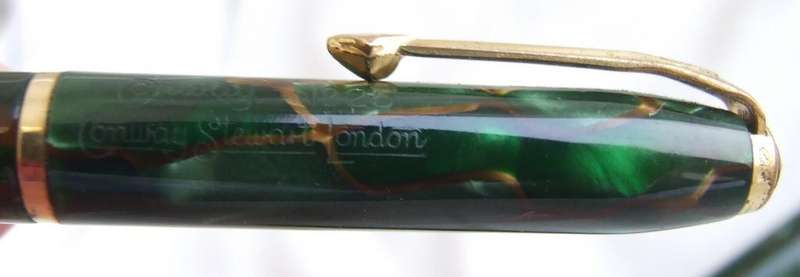 Vintage Conway Stewart "Dinkie" fountain pen and pencil green marble pair. 14ct nib.