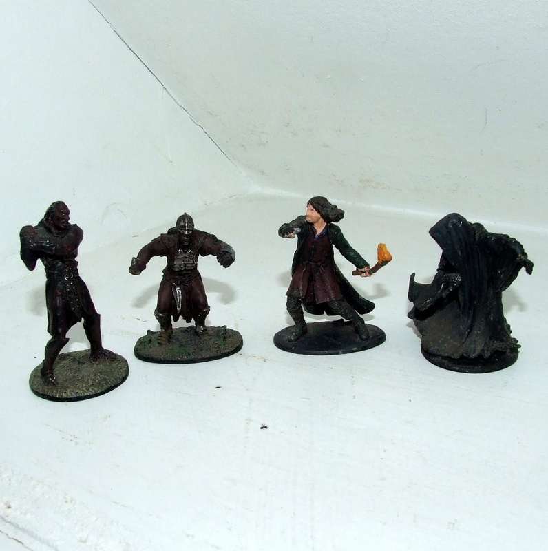 Four played with LORD OF THE RINGS figurines