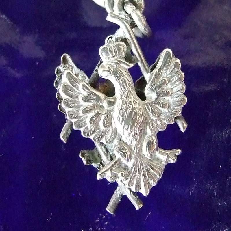 Silver floral brooch with Crowned eagle