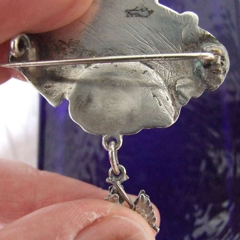Silver floral brooch with Crowned eagle