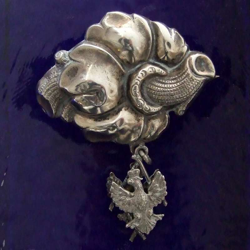 Silver floral brooch with Crowned eagle