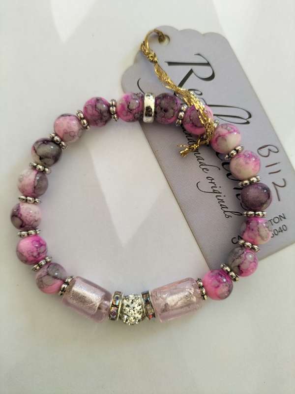 Pink/ purple sparkle bracelet. B112