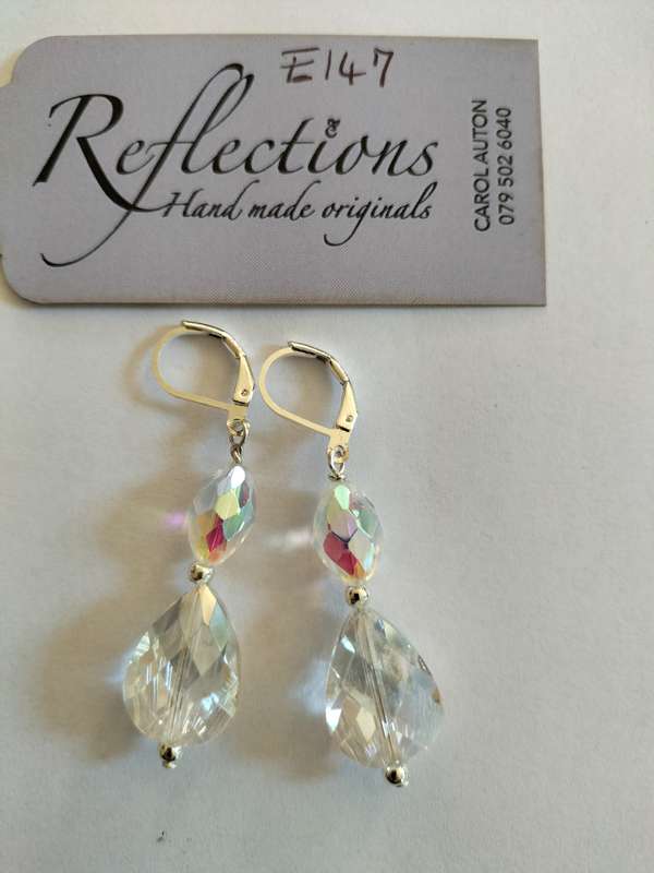 Sterling Silver huggies w double clear AB crystal drops. E147