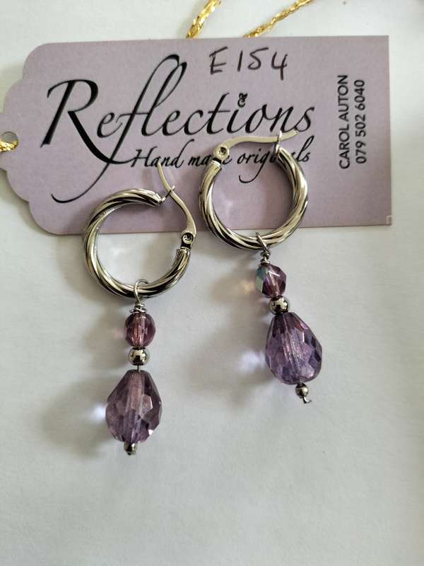 Stainless Steel rope hoops w violet crystal E154