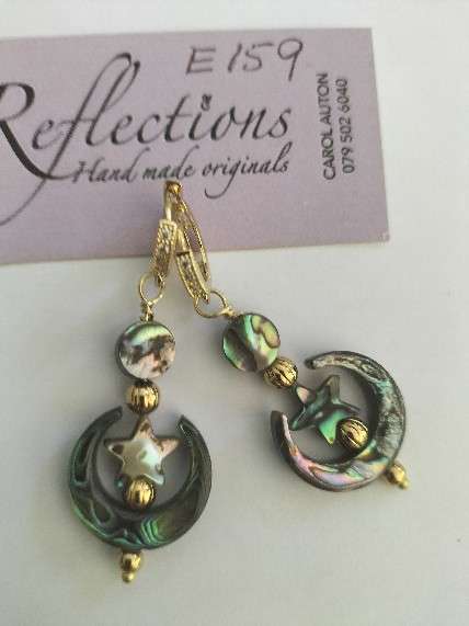 GP brass Paua shell moon & star huggies. E159