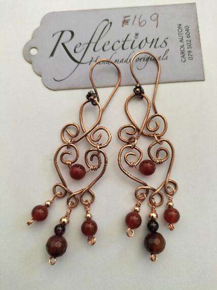 Solid copper celtic Carnelian earrings. E169