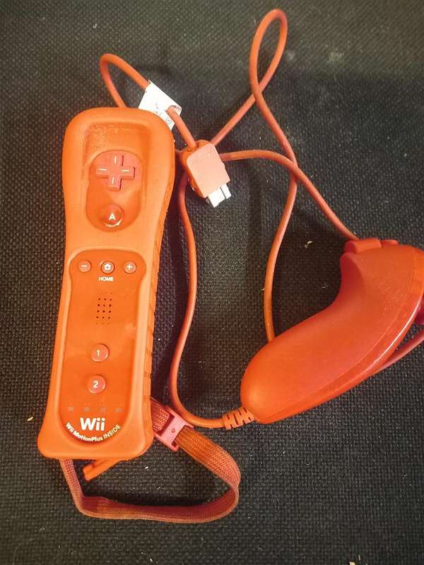 Red Wii remote and nunchuck