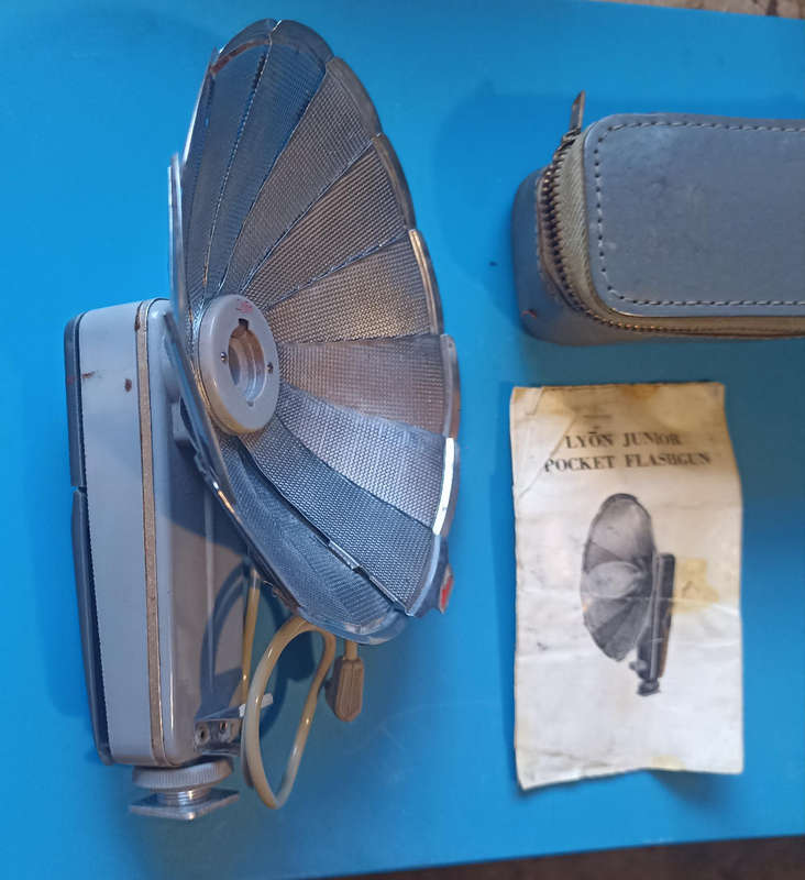 Vintage Lyon Junior Camera Flashgun with instructions and leather case