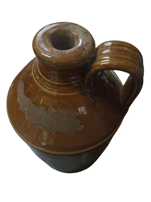 Vintage one gallon iron stone bottle