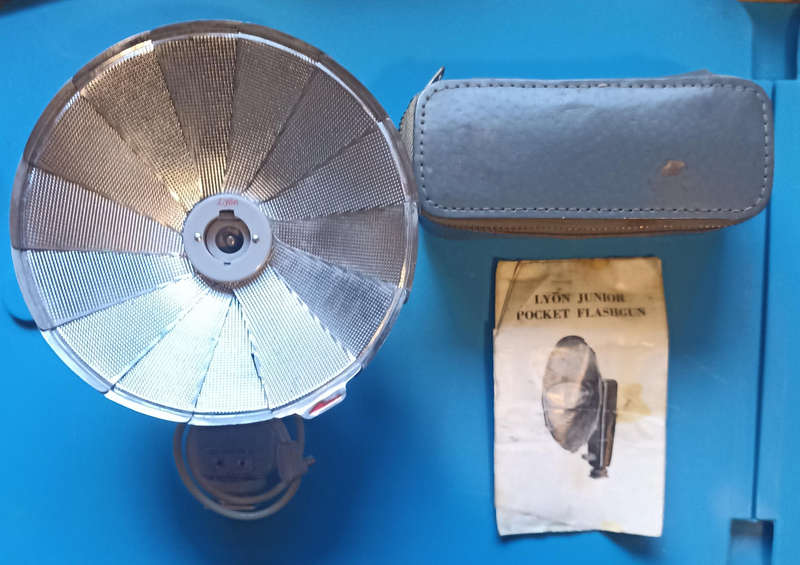 Vintage Lyon Junior Camera Flashgun with instructions and leather case