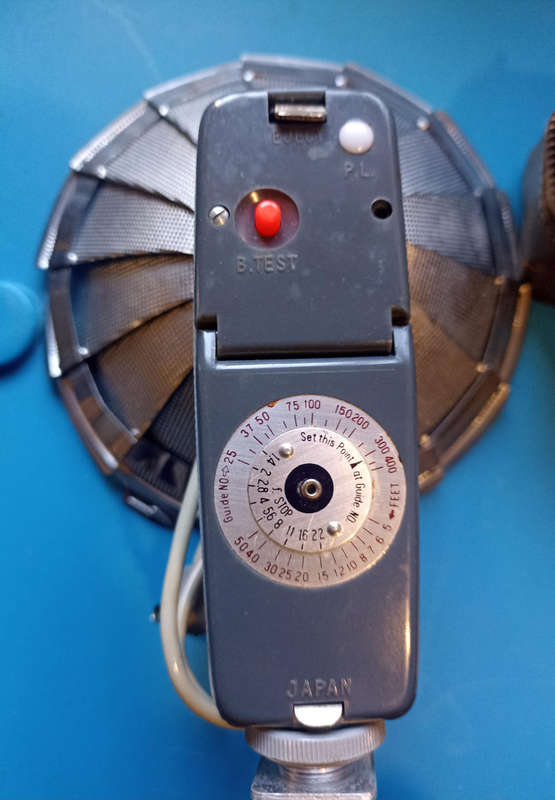 Vintage Lyon Junior Camera Flashgun with instructions and leather case
