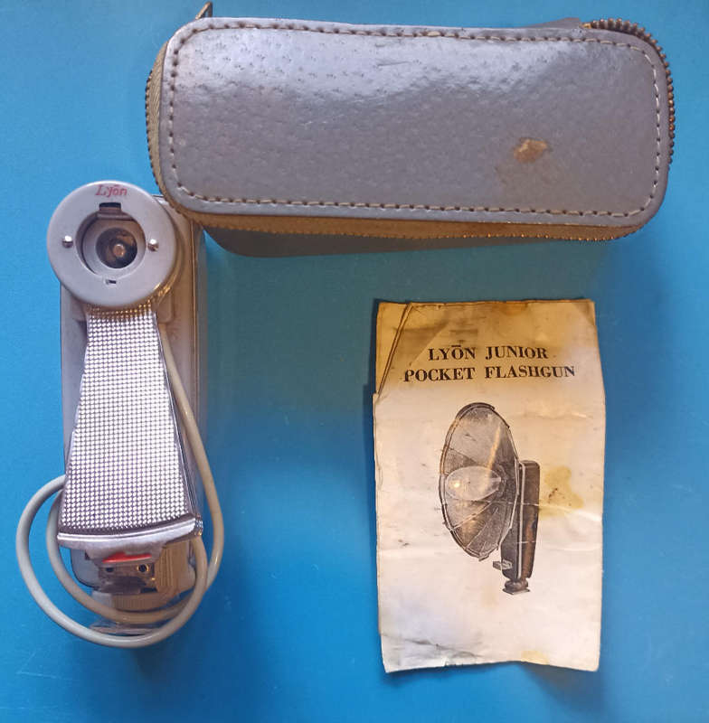 Vintage Lyon Junior Camera Flashgun with instructions and leather case