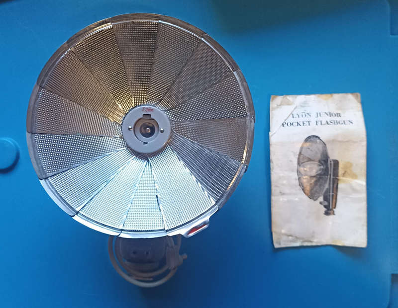 Vintage Lyon Junior Camera Flashgun with instructions and leather case