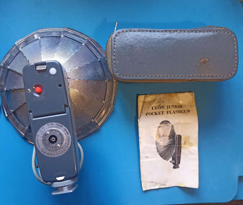 Vintage Lyon Junior Camera Flashgun with instructions and leather case