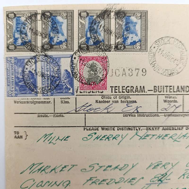 Telegram dated 1947 with 7 South African stamps - A stock report from South Africa to USA