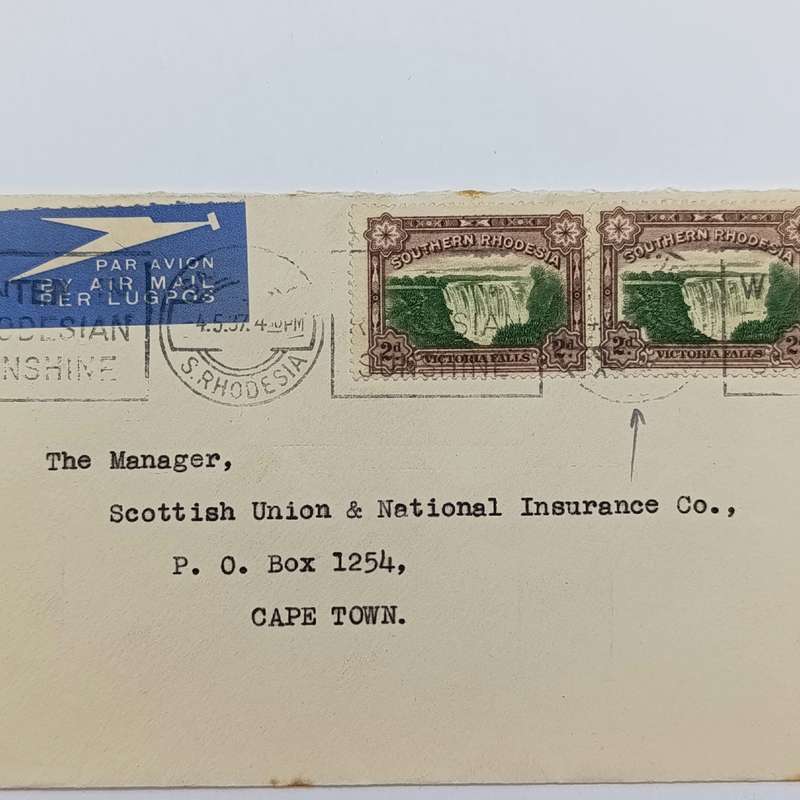 Postal Cover with pair of Southern Rhodesia Victoria Falls 2d stamps with shifted center