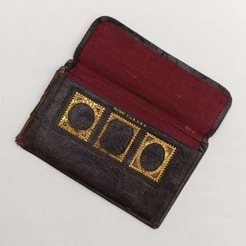 Antique leather stamp wallet