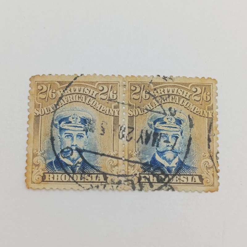 BSA Company SACC 236a pale blue pair of used 2/6 stamps