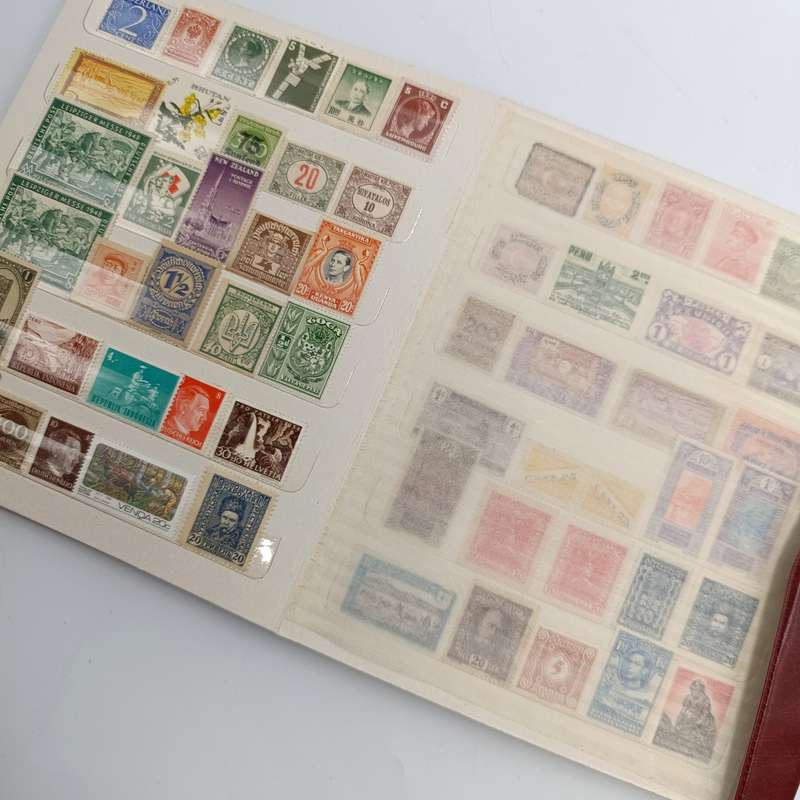 18 Page stamp world album with about 440 mint stamps - unchecked