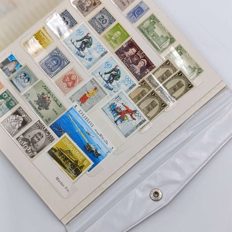 18 Page stamp world album with about 440 mint stamps - unchecked
