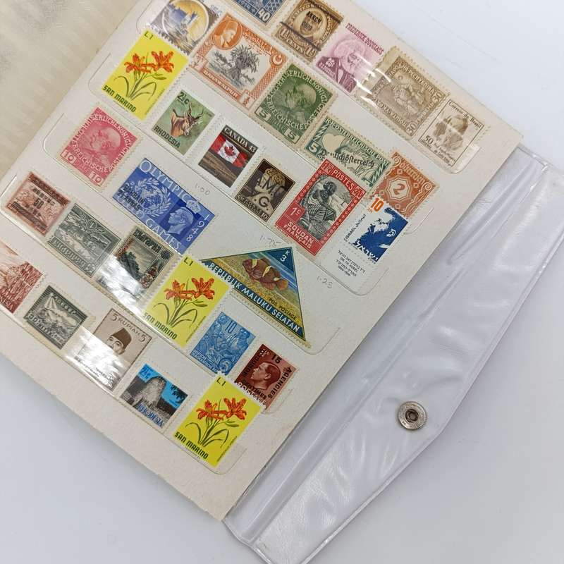 18 Page stamp world album with about 440 mint stamps - unchecked