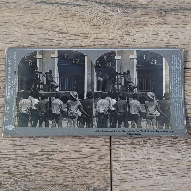 Antique stereoscope card #9956 Execution by the Garrote in the Yard of the City Prison, Havana, Cuba