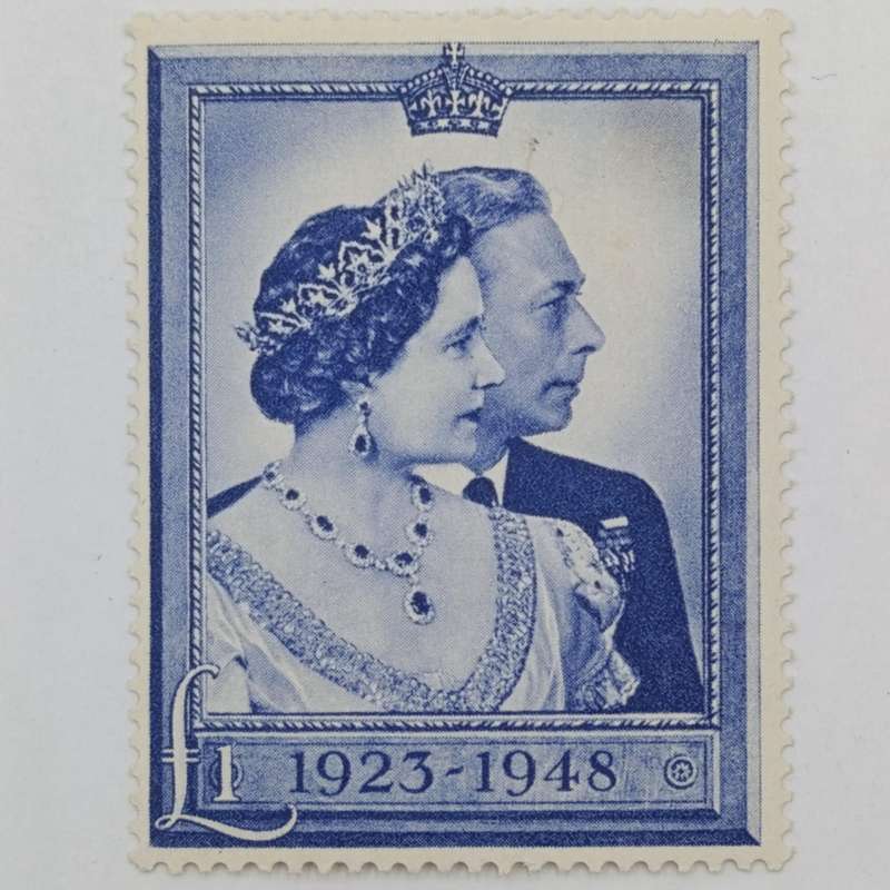 Great Britain Royal silver wedding 1 pound mint hinged stamp plus used stamp